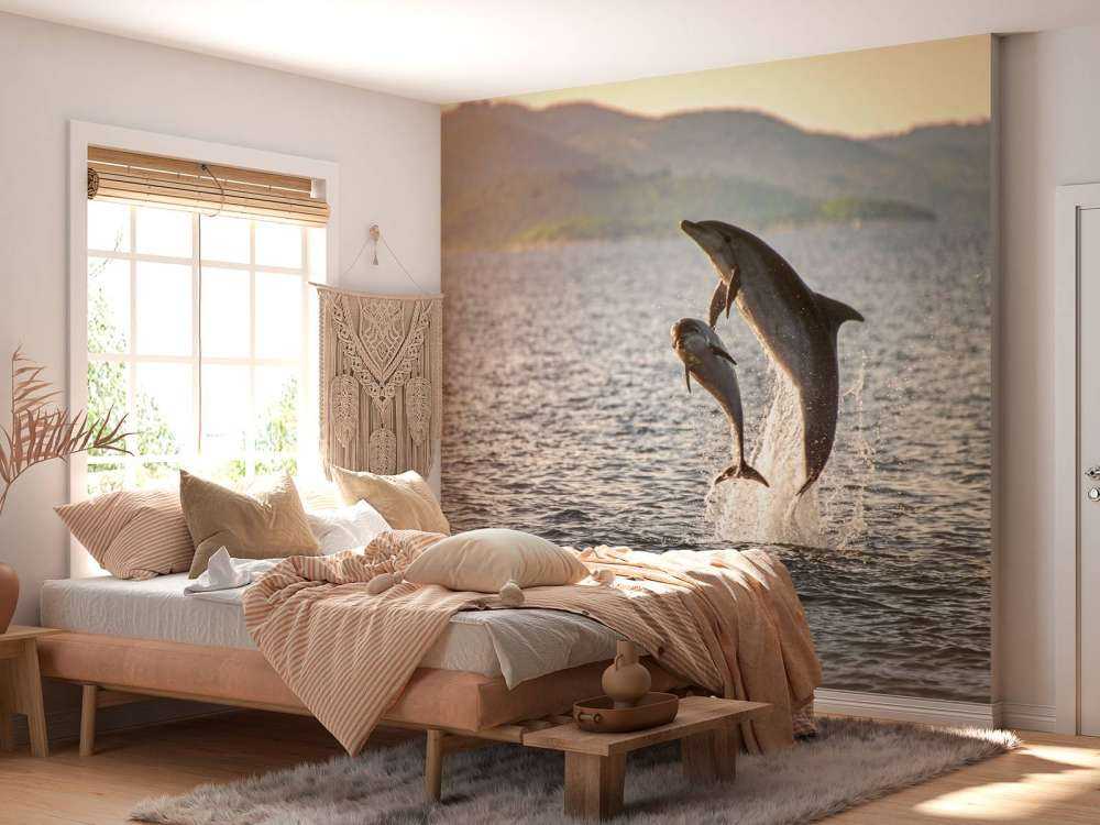 Twee springende dolfijnen