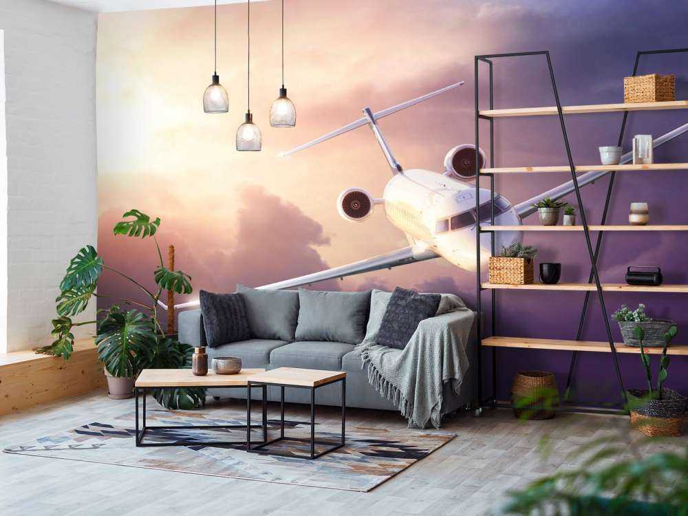 Witte vliegtuig bij zonsondergang