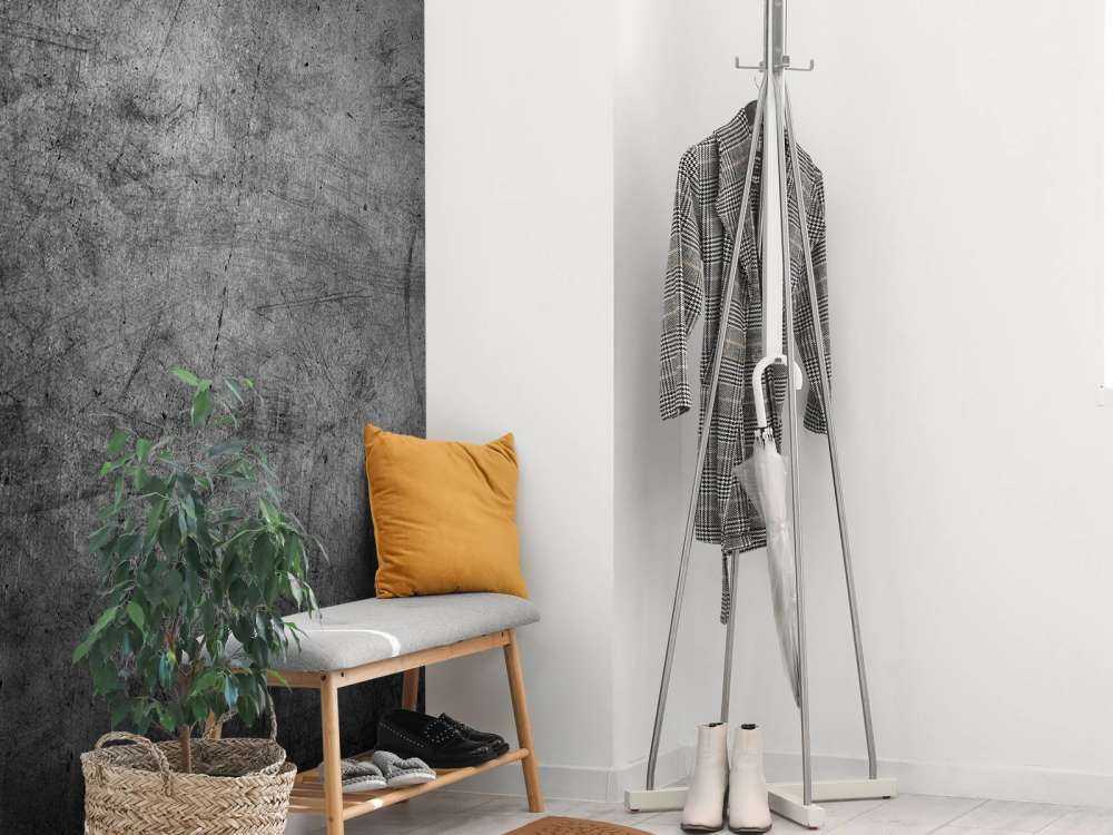 Grijze muur met krassen