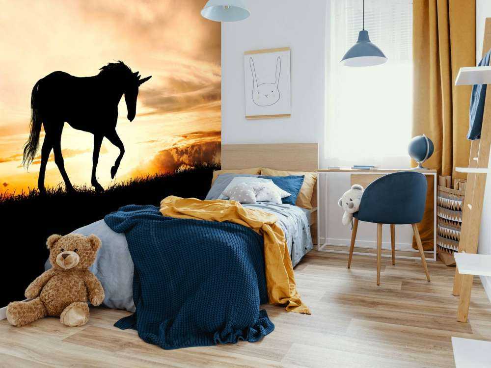 Unicorn silhouette bij zonsondergang