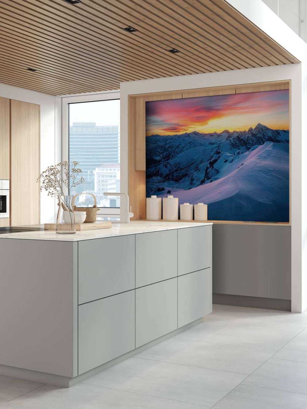 Besneeuwde pieken bij dageraad