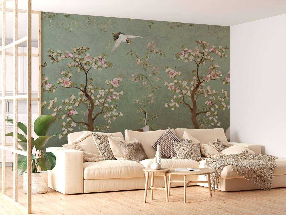 Sierlijke kraanvogels in bloesemlandschap