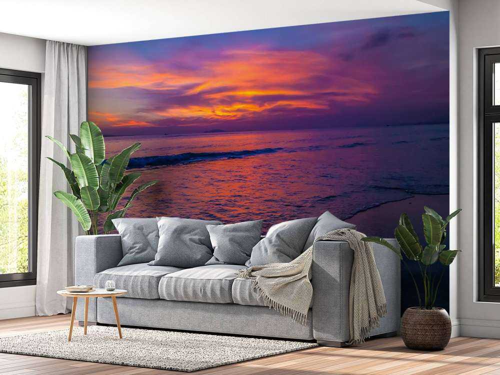 Paarse zonsondergang op het strand