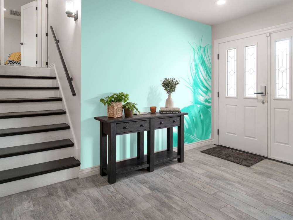 Blauwe achtergrond met exotische bladeren