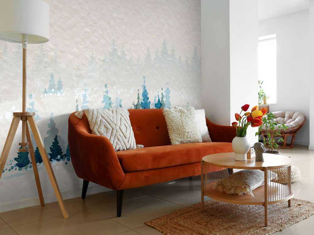 Winterlandschap met dennenbomen en een hert