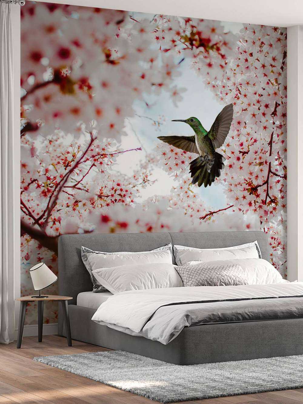 Kolibrie tussen de bloesems