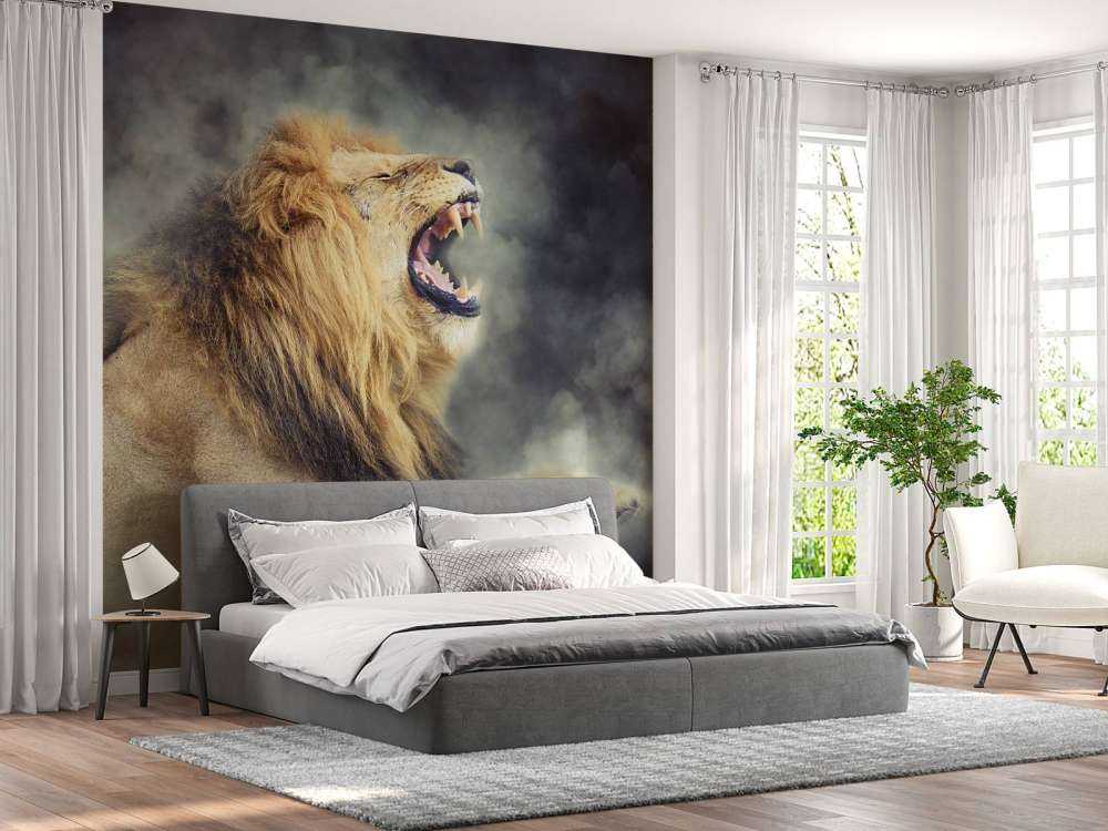 Leeuw in rook met een donkere achtergrond