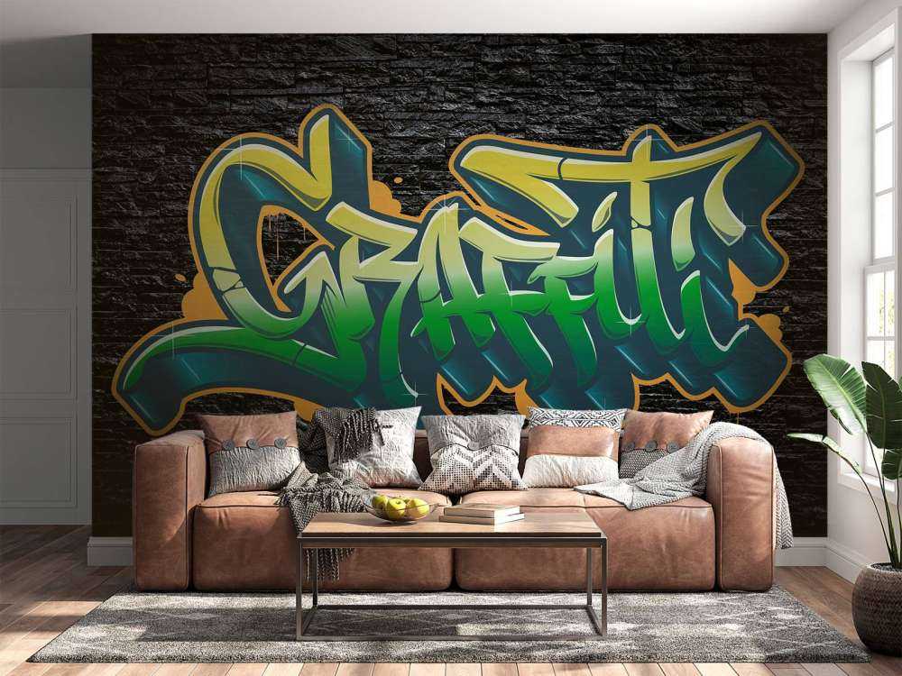 Graffiti op muur van zwarte stenen