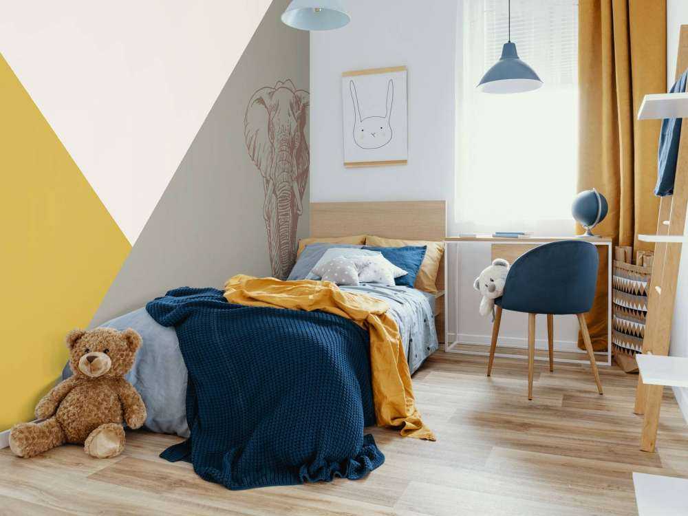 Driehoeken in okergeel en groen met olifant