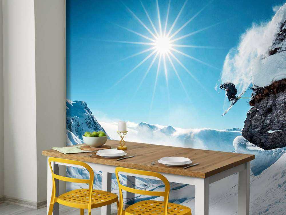 Vrije sprong in zonovergoten sneeuwlandschap