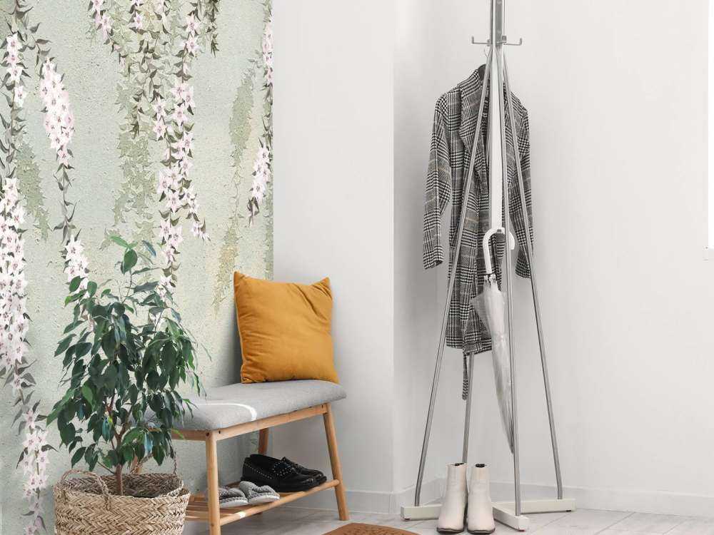 Bloemtakken op groen beton