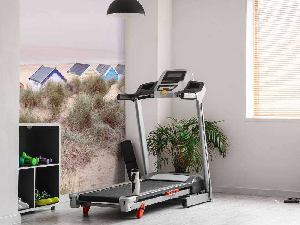 Beach huts on sandy seashore