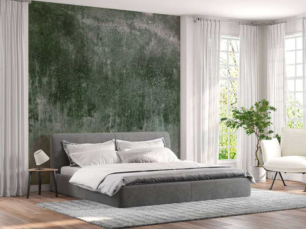 Oude verweerde groene muur