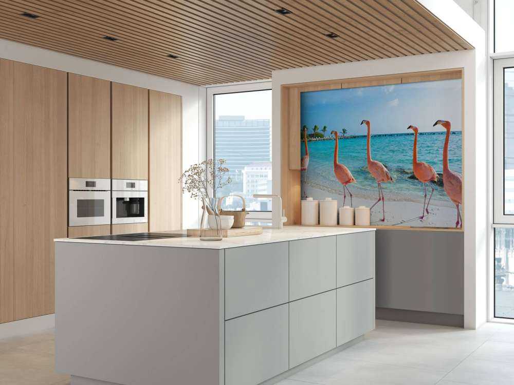 Rij van flamingo's op het strand