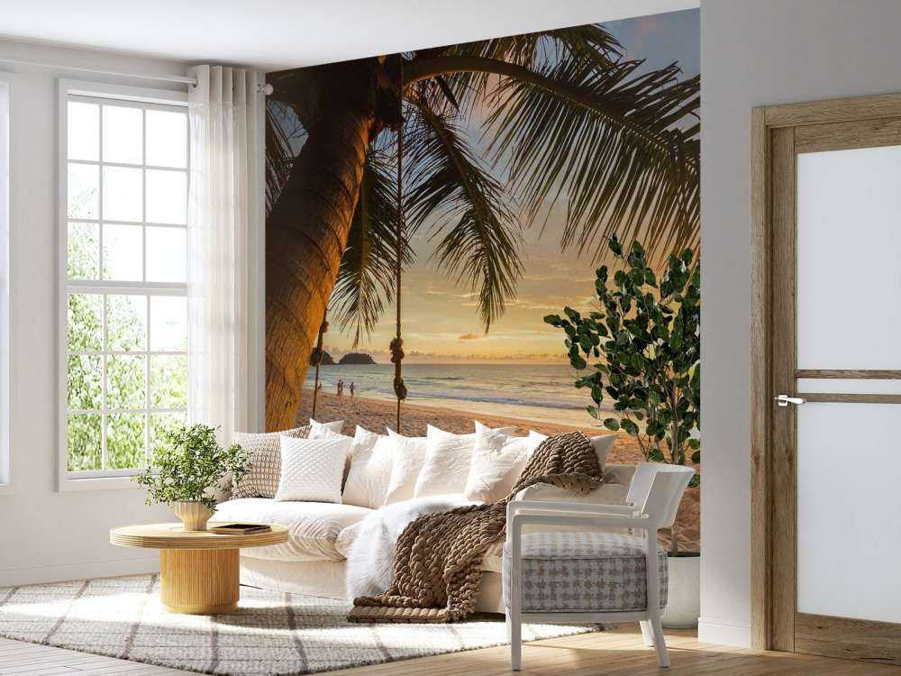 Palmboom bij zonsondergang