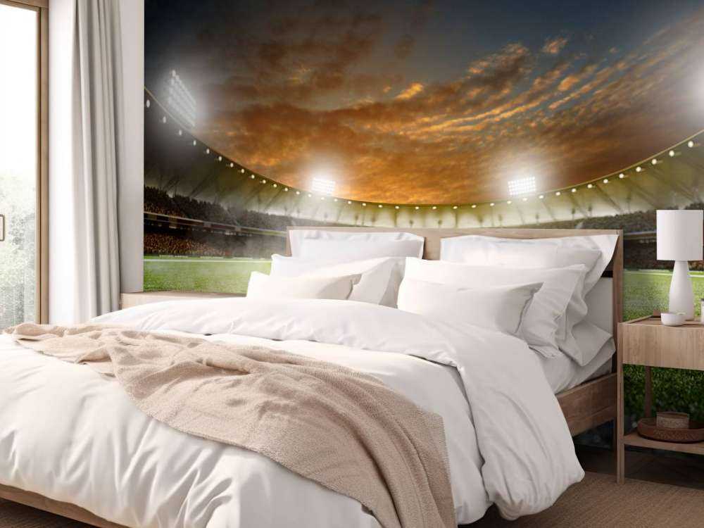 Verlicht voetbalstadion met wolken