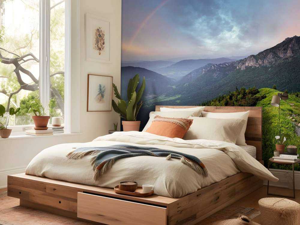 Regenboog boven een berglandschap