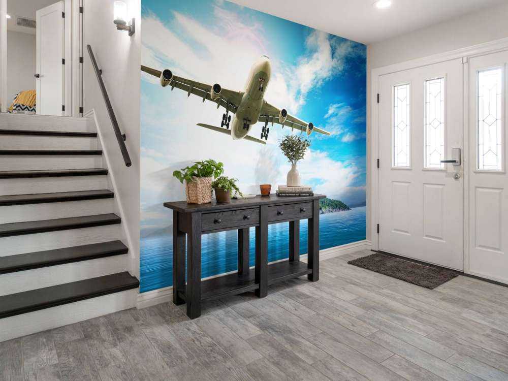 Passagiersvliegtuig boven een tropische zee