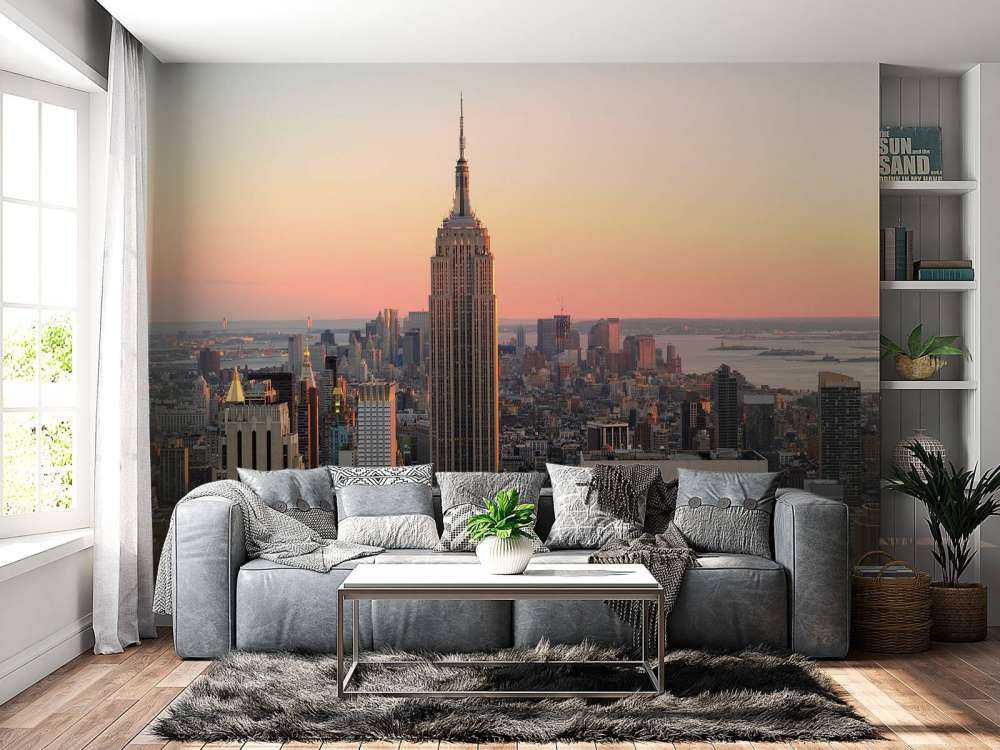 De Skyline van New York bij zonsondergang