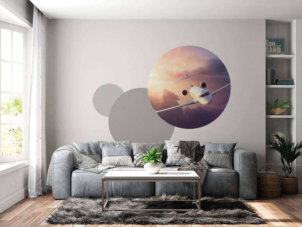 Witte vliegtuig bij zonsondergang