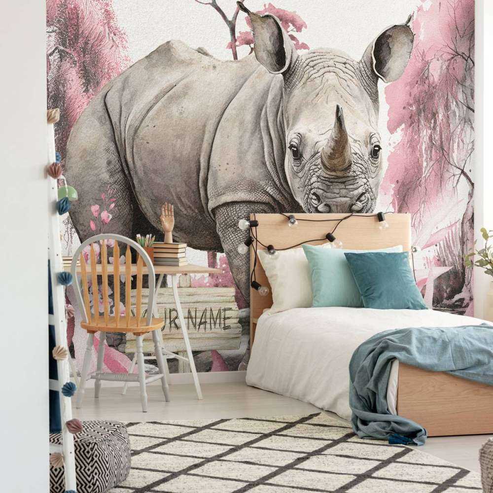 Baby neushoorn op de savanne roze