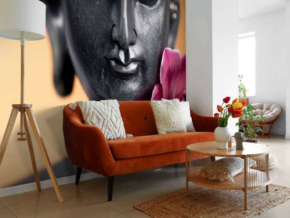 Buddha en roze orchidee