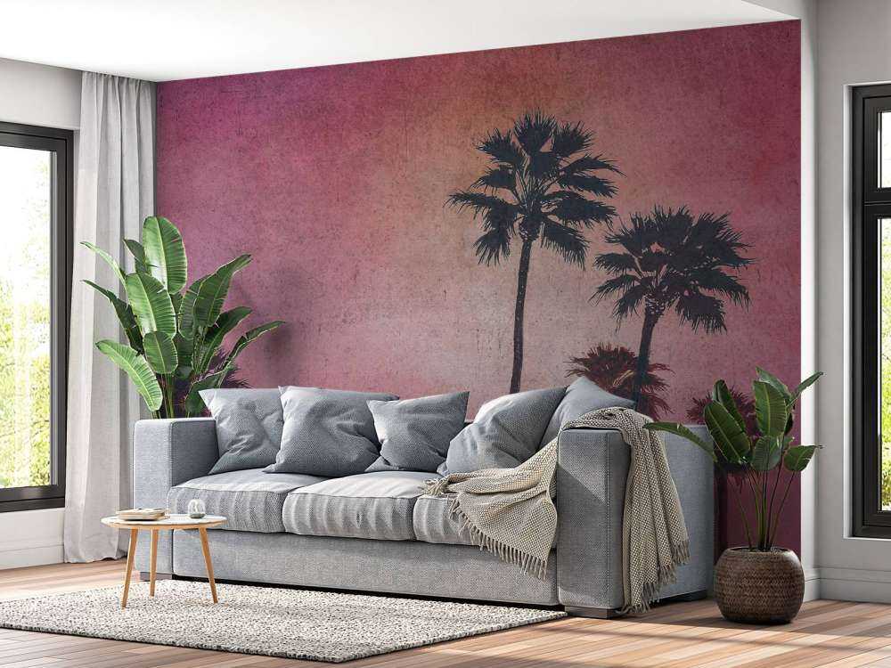 Palmbomen in roze avondgloed