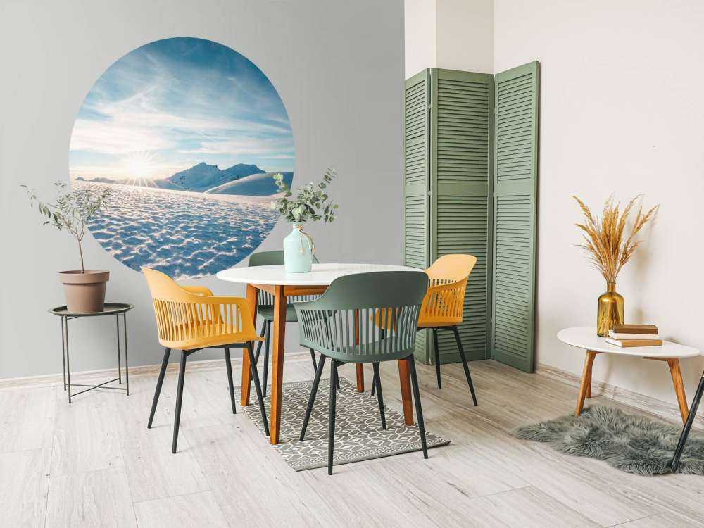 Ochtendzon over glinsterende sneeuwvlaktes