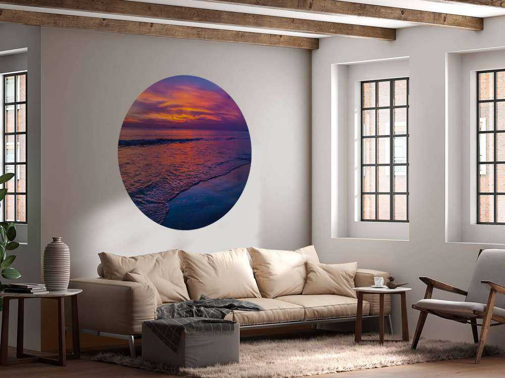 Paarse zonsondergang op het strand