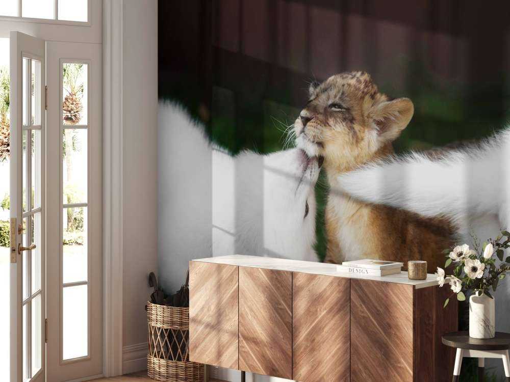 Welpje speelt met Zwitserse witte herders