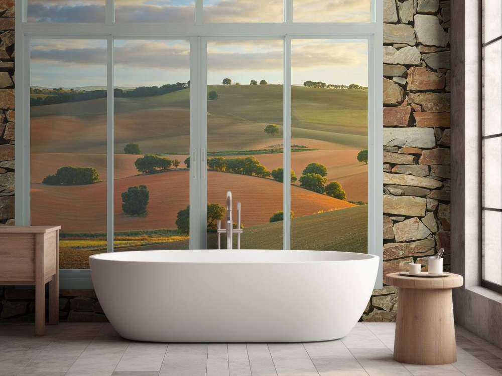 Glooiende heuvels in avondlicht