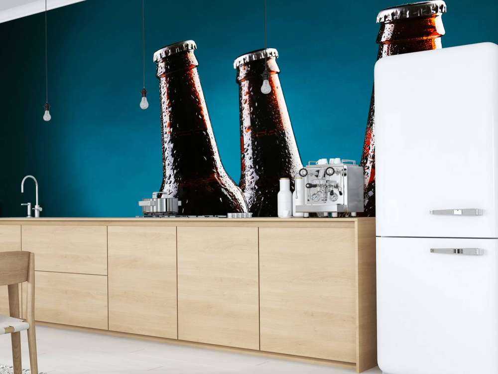 Bruine bierflesjes in ijs