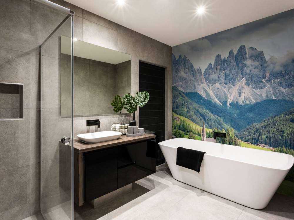 Alpendorp in groene vallei