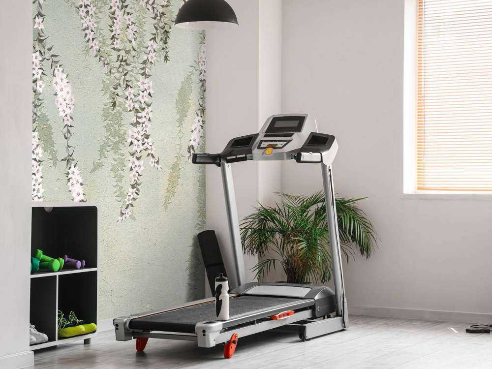 Bloemtakken op groen beton