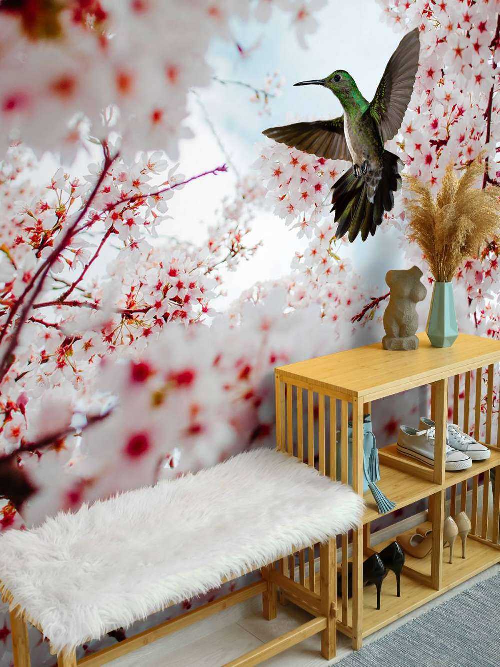 Kolibrie tussen de bloesems