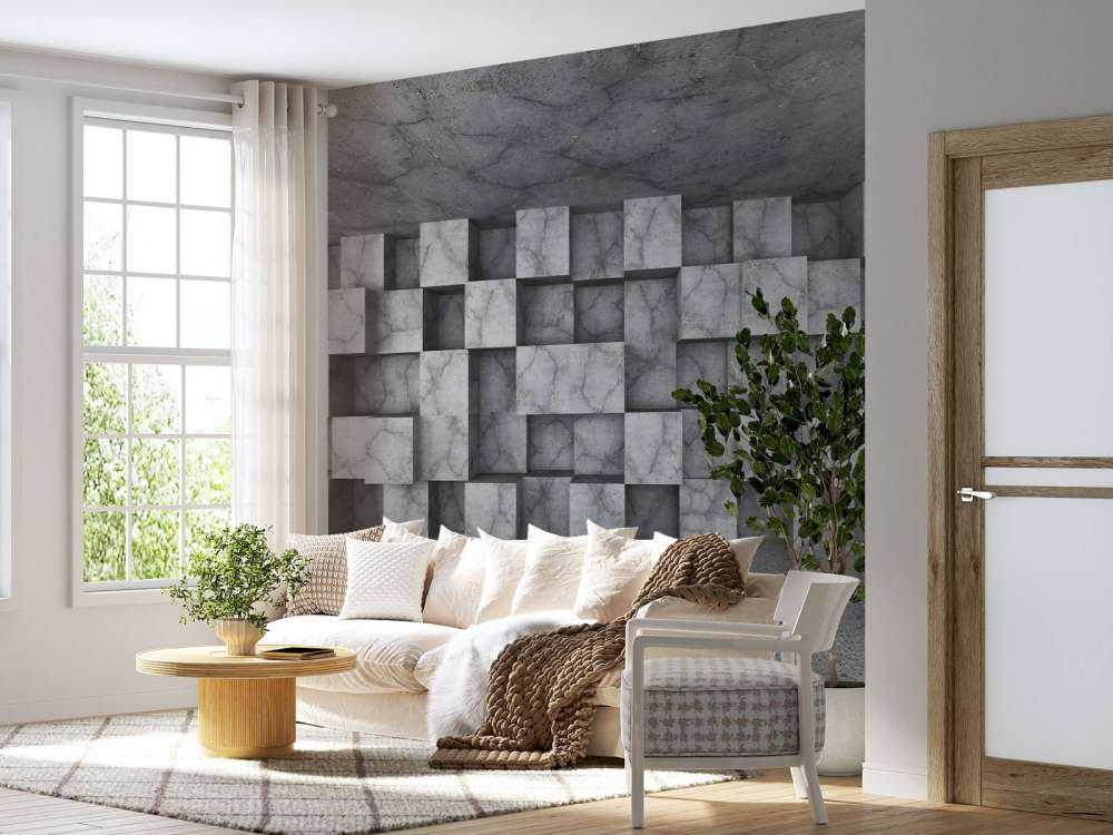 Betonnen ruimte met kubussen tegen de muur