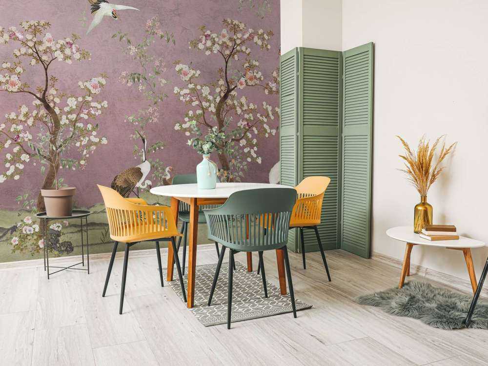 Kraanvogels onder bloesemroze hemel