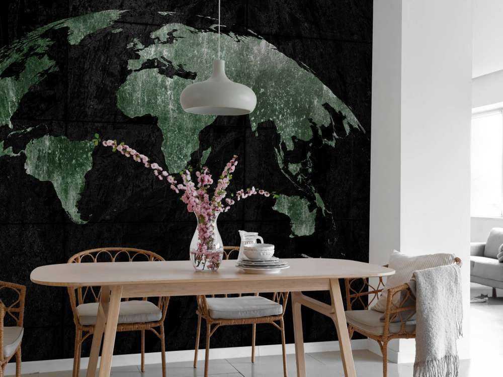 Groene wereldkaart op beton