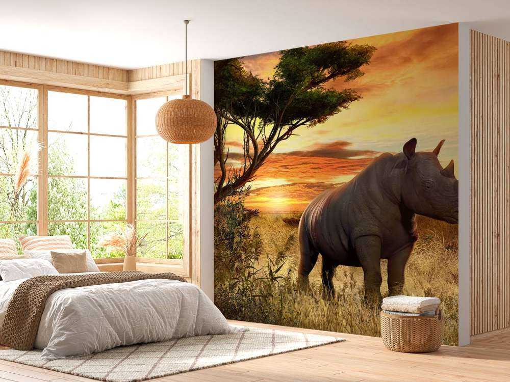 Neushoorn bij zonsondergang