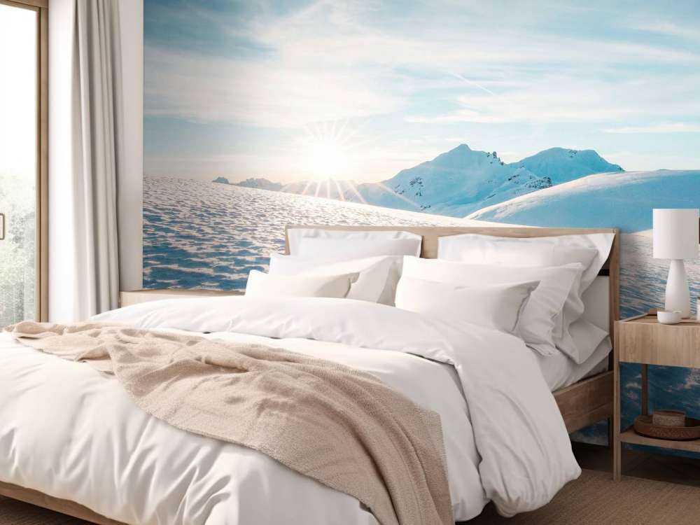 Ochtendzon over glinsterende sneeuwvlaktes