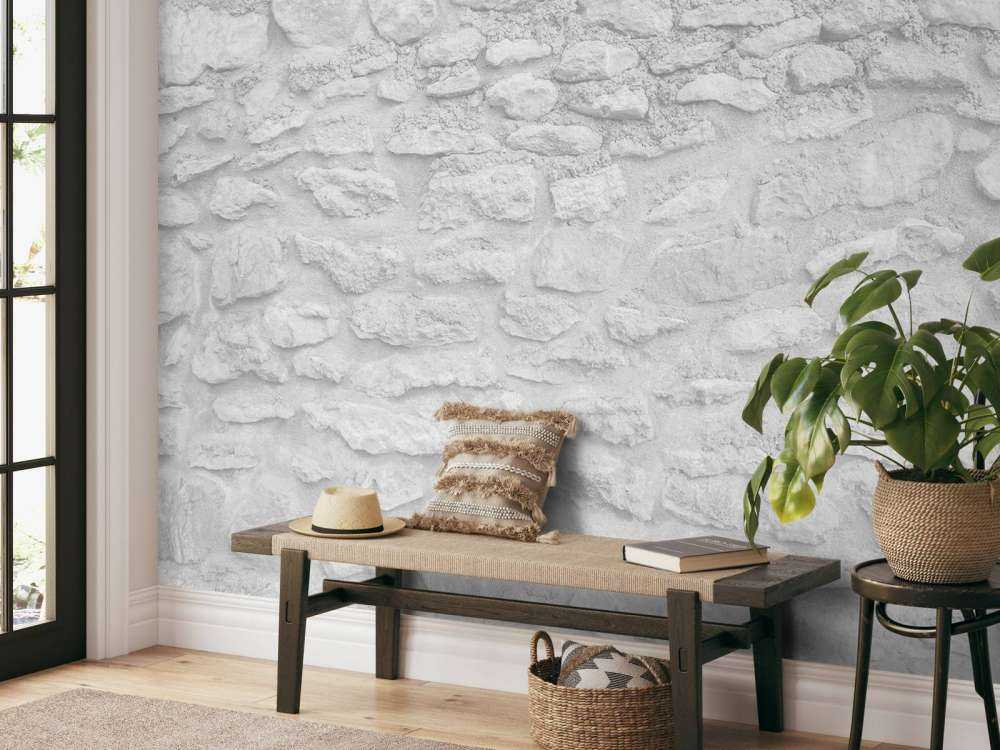 Lichte muur met grove stenen