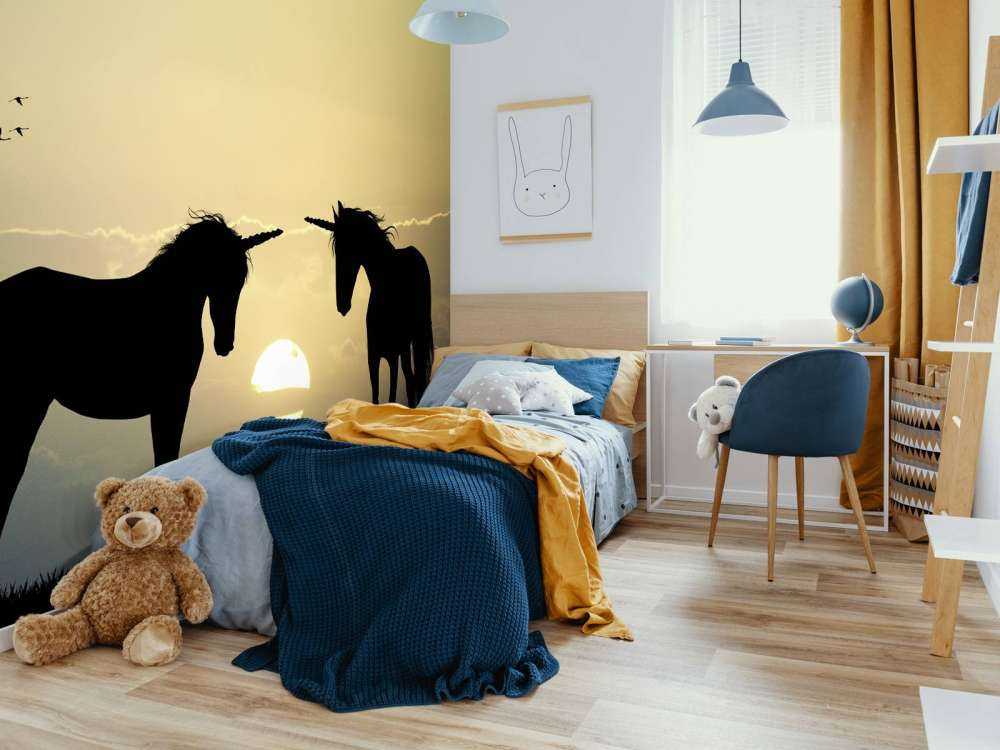 Unicorns bij een zonsondergang