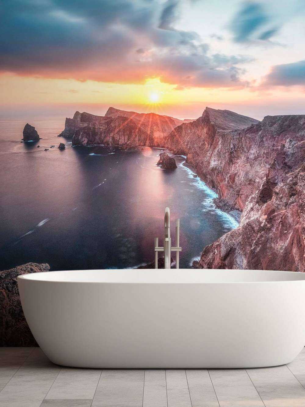 Zonsondergang boven rotskust