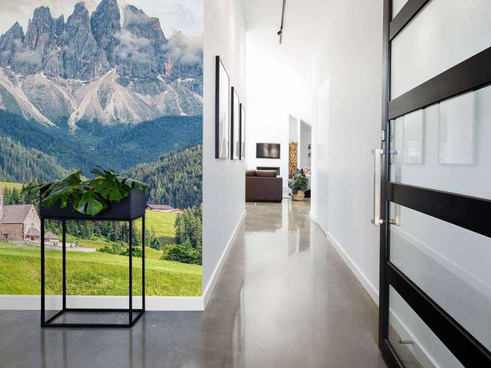 Alpendorp in groene vallei