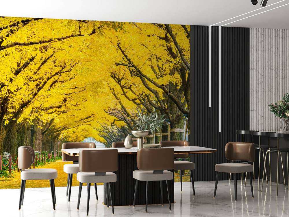 Twee rijen van gele ginkgobomen in de herfst