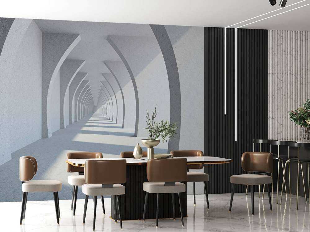 Een lange witte gang met grote zuilen