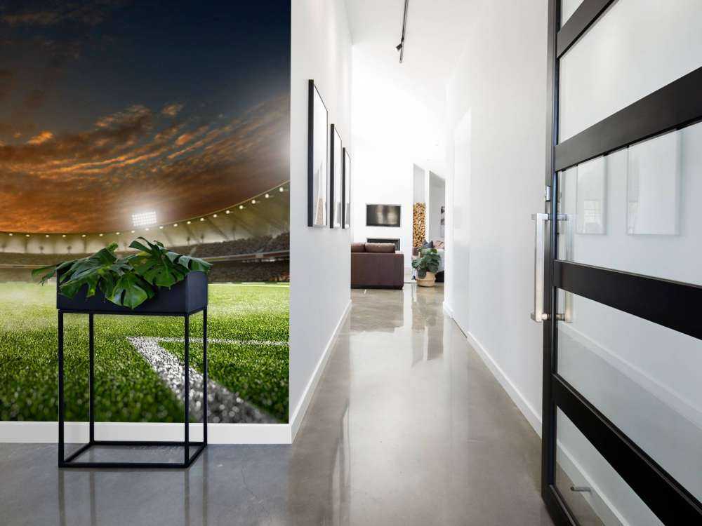 Verlicht voetbalstadion met wolken