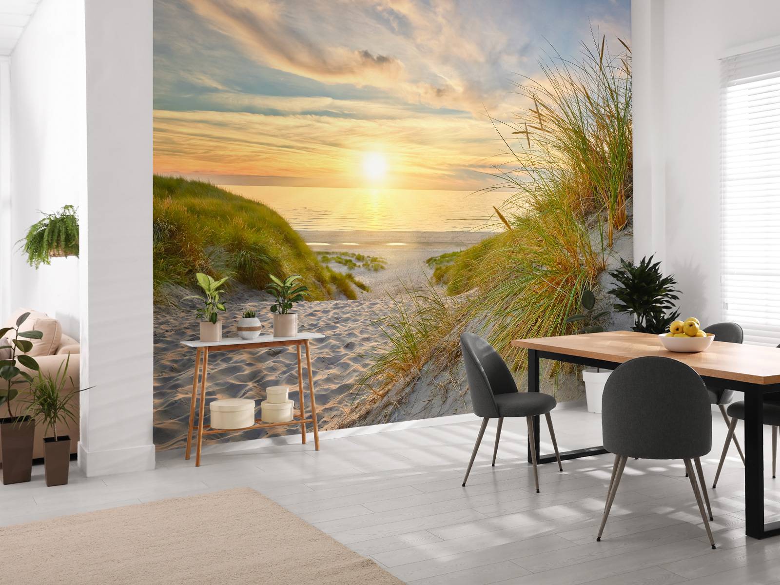 Zonsondergang aan duinstrand