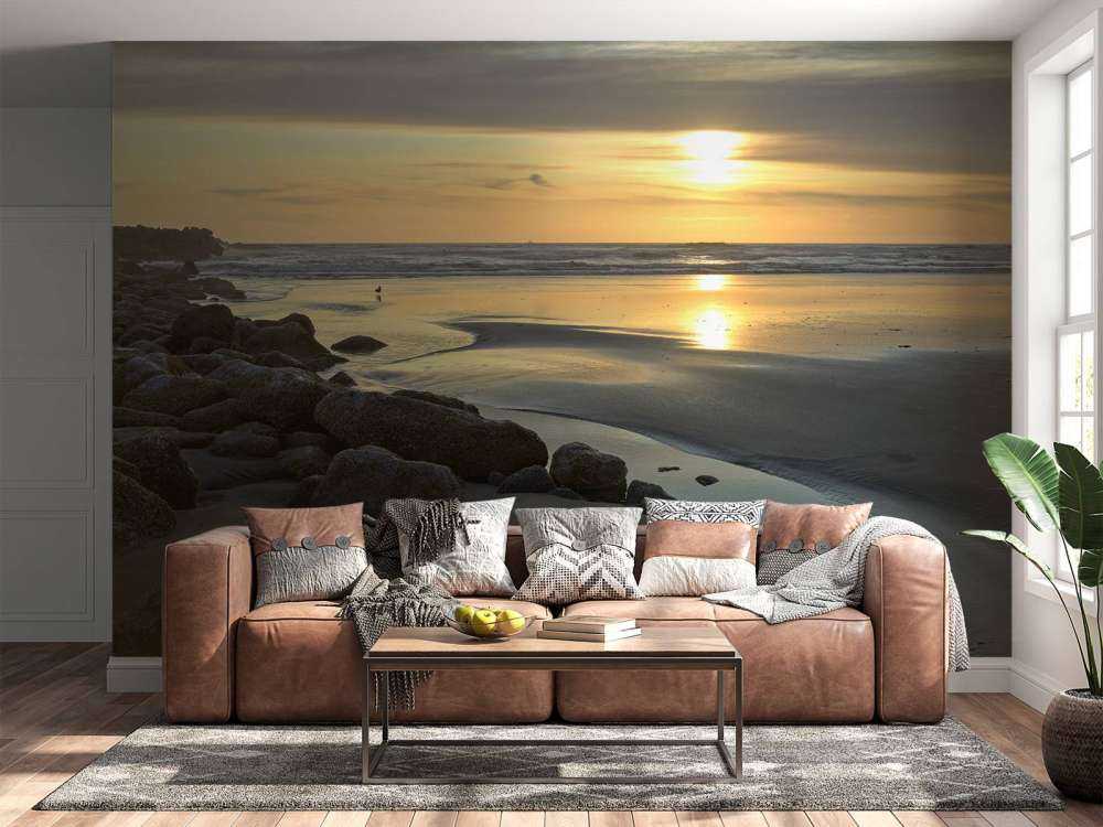 Zonsondergang bij een strand