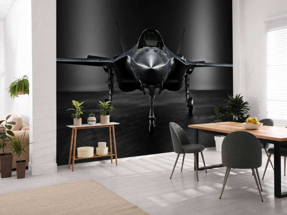 Zwarte F35 in een donkere ruimte